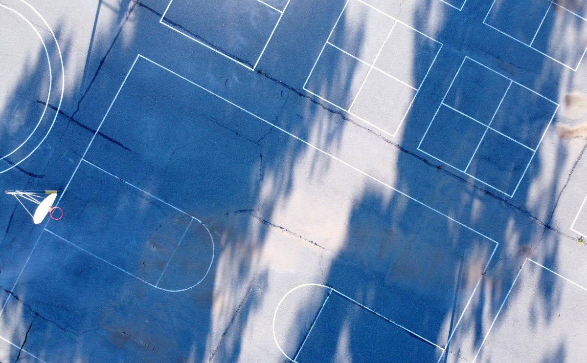 Photo © Eric Platt 2000, "Symphony in PlayGround Pavement, Tree Shadows, and One Hoop"
